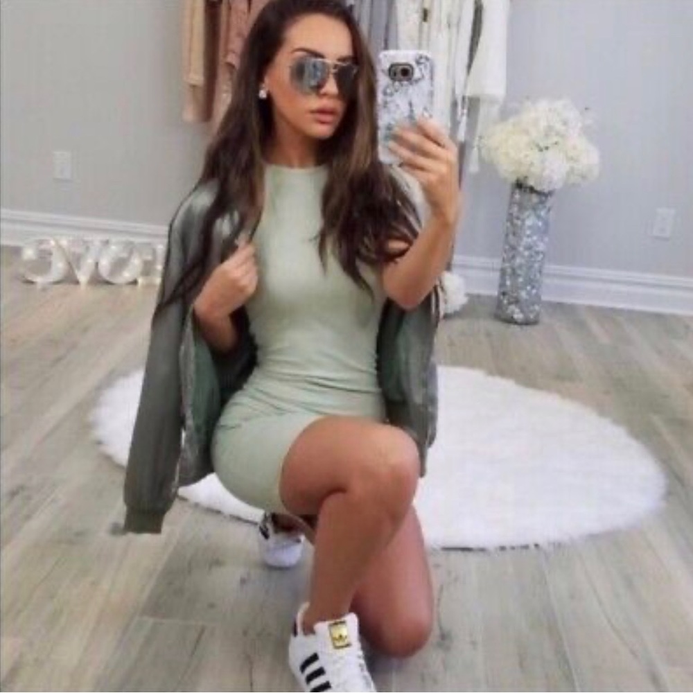 Original Carli Bybel x Missguided collection green ribbed bodycon dress.